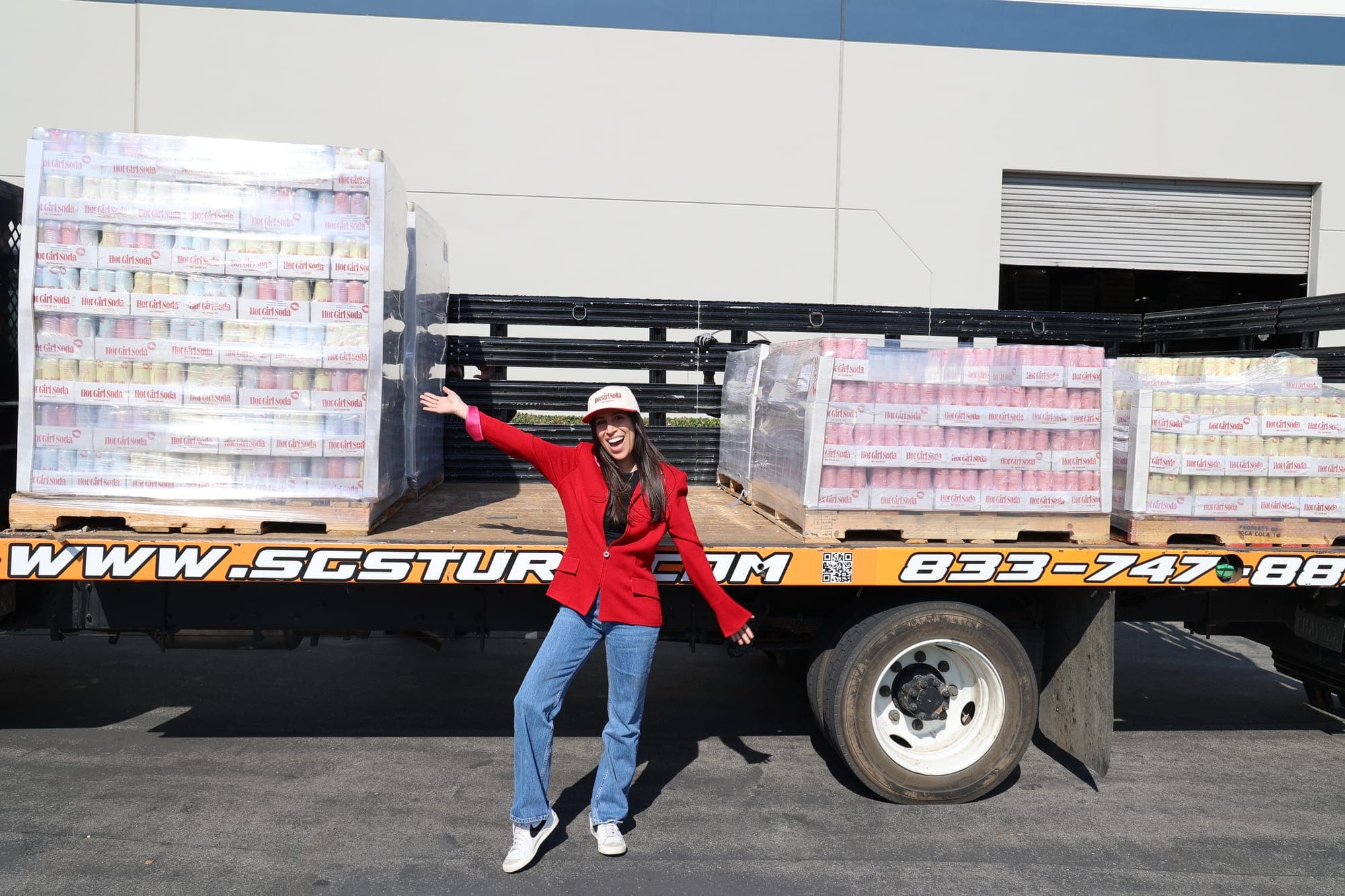 Aarica celebrating the first Hot Girl Soda shipment